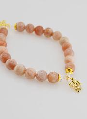 Bracelet en Pierre de Soleil 8mm - Ange et Croix